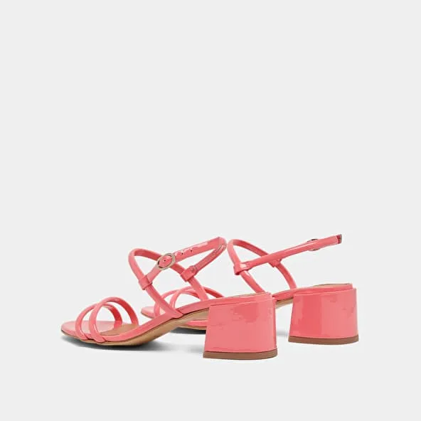 Heeled sandals in coral patent