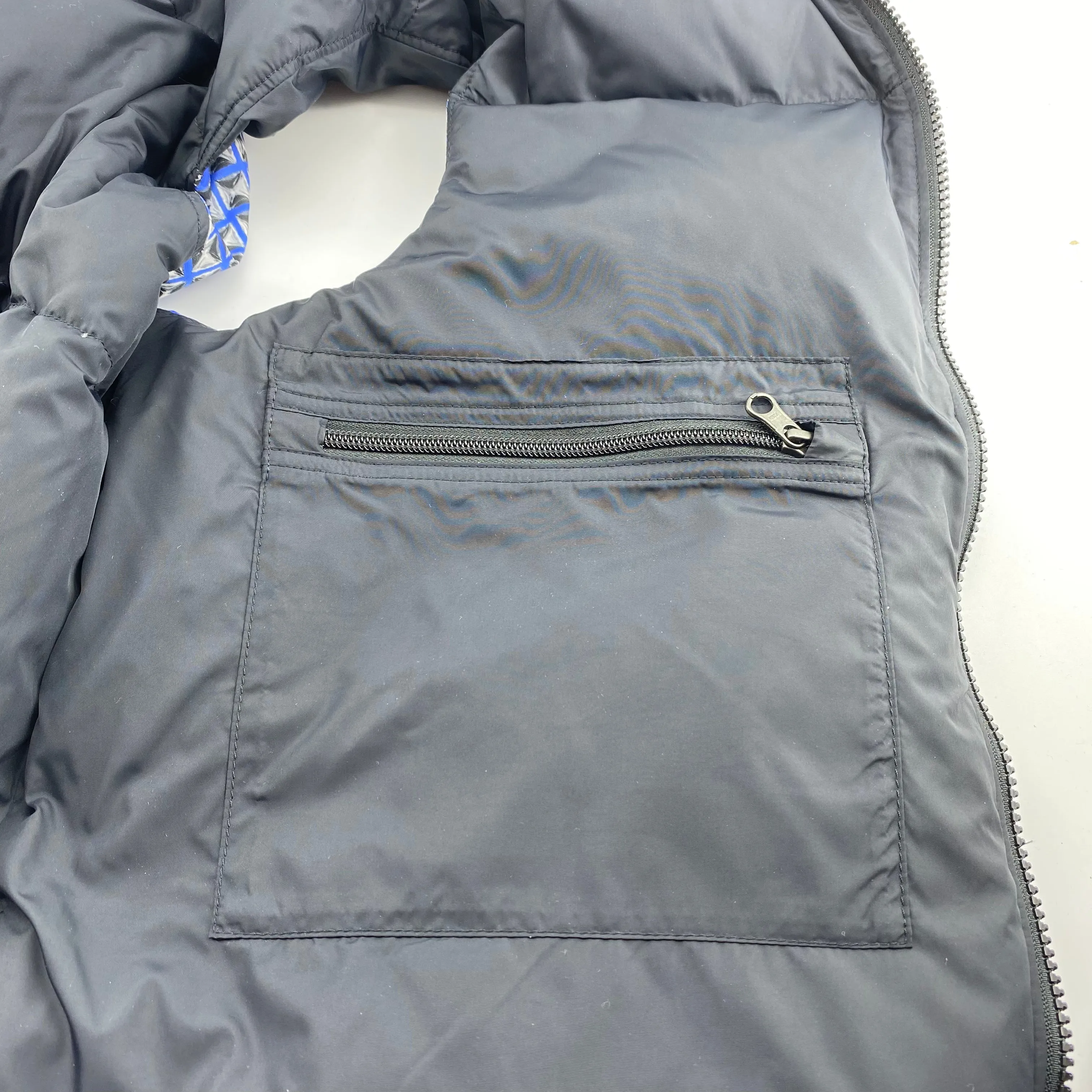 The north face & supreme studded Nuptse vest